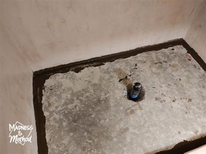 Can you put a shower tray on tiles