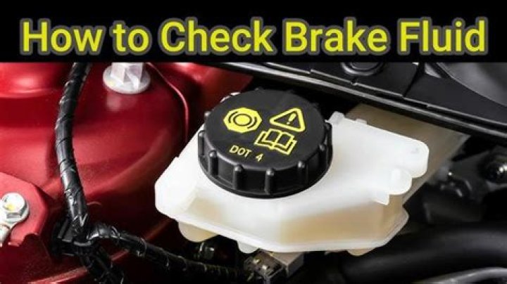 Does car need to be running to check brake fluid?