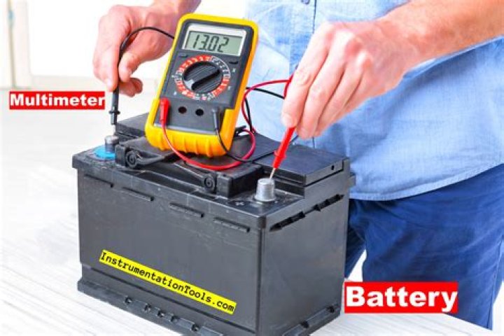 How do I test my refrigerator with a multimeter?
