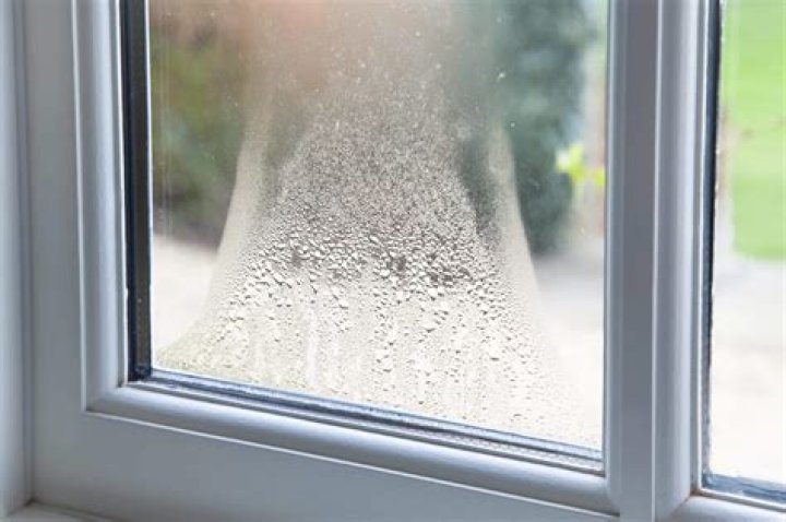 How do you clean the inside of a double pane window?