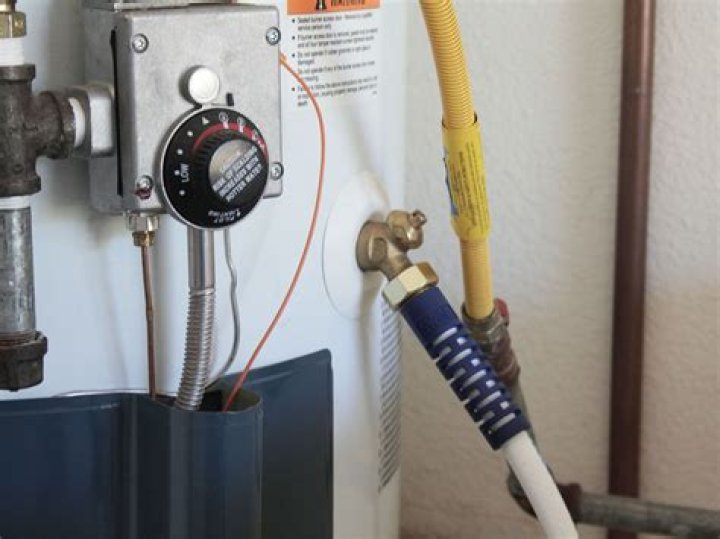 How do you flush out a hot water heater?