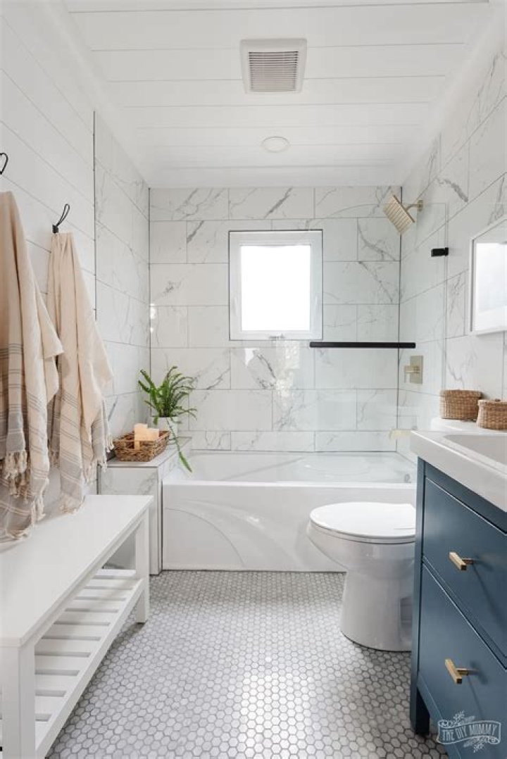 How do you get blue dye out of a white tub?