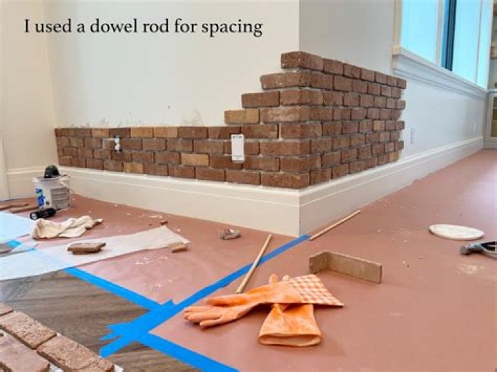 How do you lay a brick veneer floor