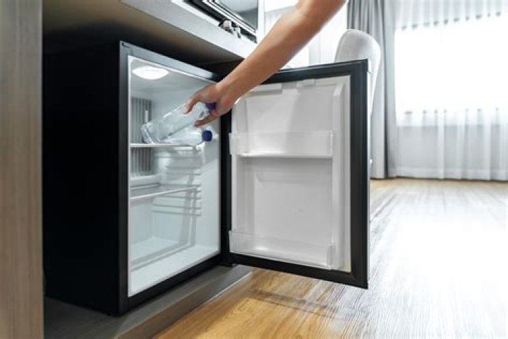 How do you remove a built in cabinet from a refrigerator?