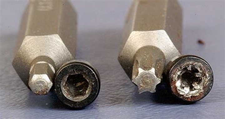 How do you remove angled screws?
