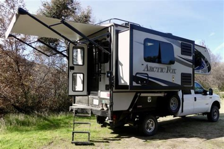 How does a slide out camper work in an Arctic fox?