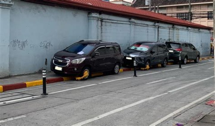 Is it illegal to Park in front of a school?