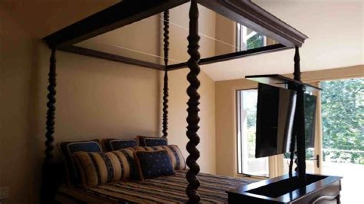 Mirror On Ceiling Above Bed