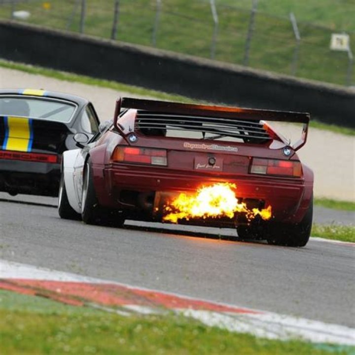 What causes backfiring through the exhaust?