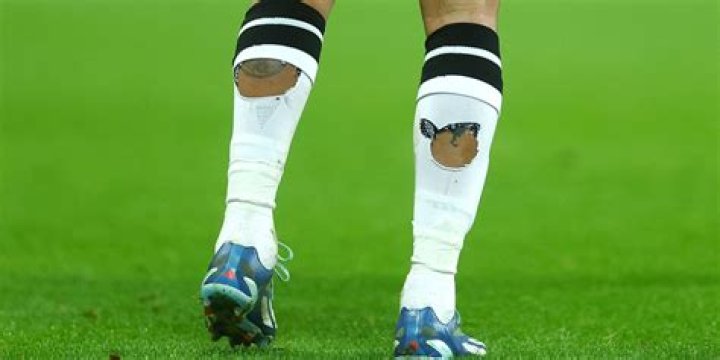 What do holes in socks symbolize?
