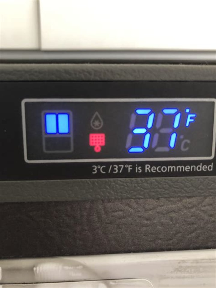 What does a red light mean on a fridge freezer?