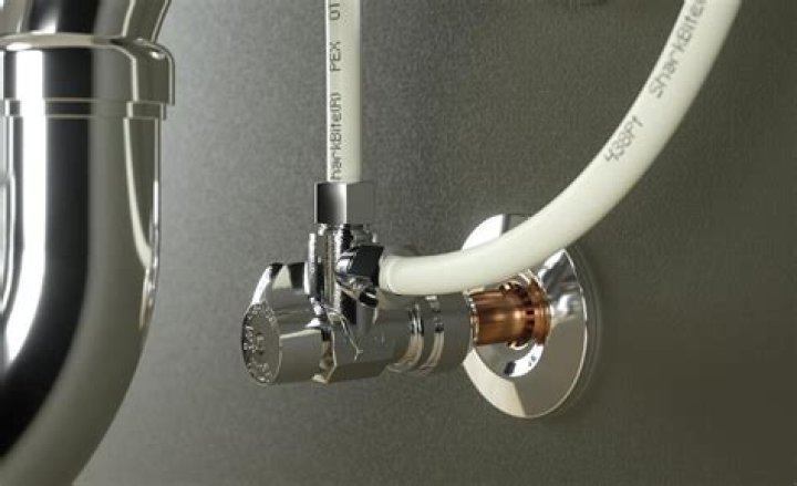 What does a refrigerator water line shut-off valve look like?
