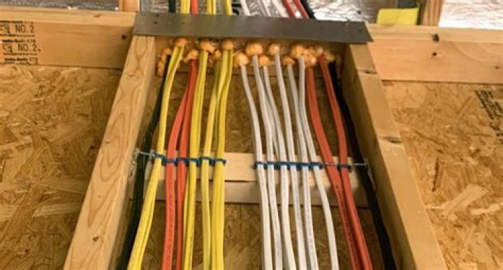 What does the dashed line in electrical wiring mean?