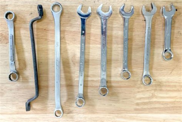 What is the advantage of a box wrench over an open ended wrench