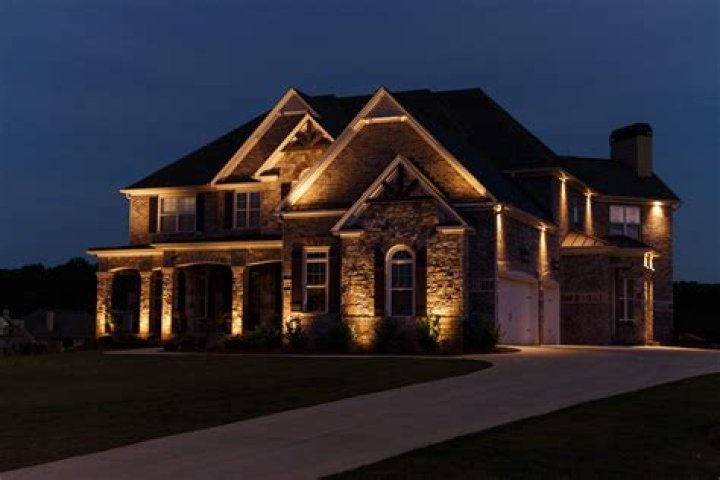 What is used to automatically switch the lights outside a house on or off as it gets darker or lighter?