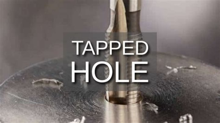What kind of hole is a tapped hole?