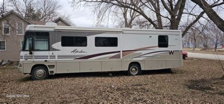 What kind of RV is the 2003 Winnebago Adventurer?
