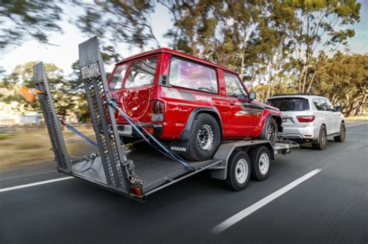 When towing a car on a dolly should it be in park?