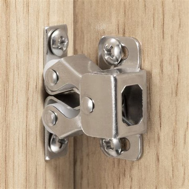 Where do you put a latch on a cabinet?