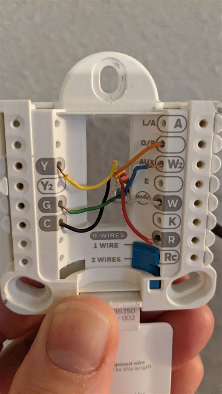 Where does the wire go on a Honeywell thermostat?