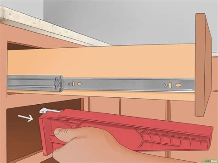 Why did my drawer slide get stuck in the cabinet?