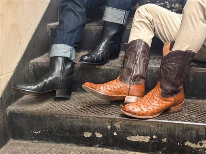 Why do cowboys wear leather boots?