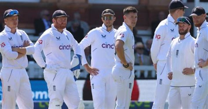 Why do cricketers choose mostly white clothing during daylight matches?