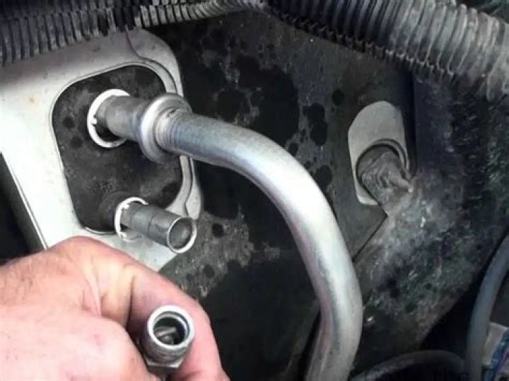 Why does my car leak water when the AC is on?