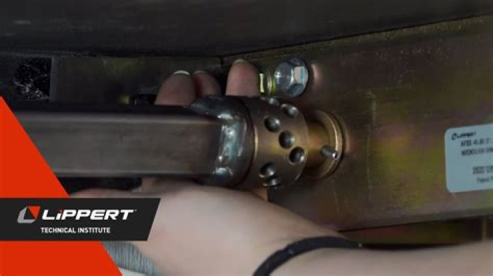 Why does my Lippert hydraulic jack make a cracking noise?