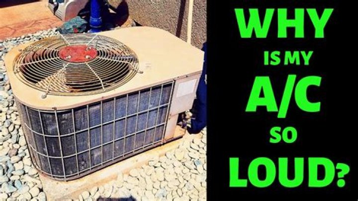 Why is my AC compressor making a squealing noise?